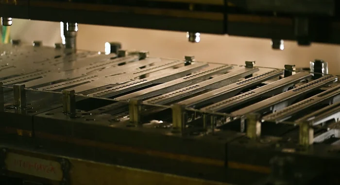 Laser-cut metal blanks for bracket production