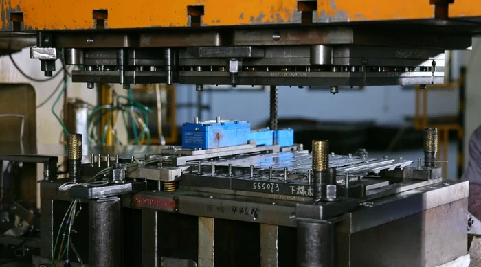 Metal stamping press at ThunderTech
